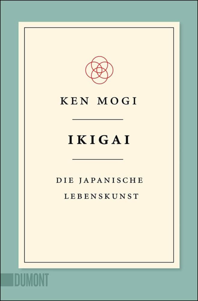 Elegantes Buchcover "Ikigai - Die japanische Lebenskunst" von Ken Mogi mit minimalistischem Design, geometrischen roten Kreisen und cremefarbenem Hintergrund, erschienen im Dumont Verlag