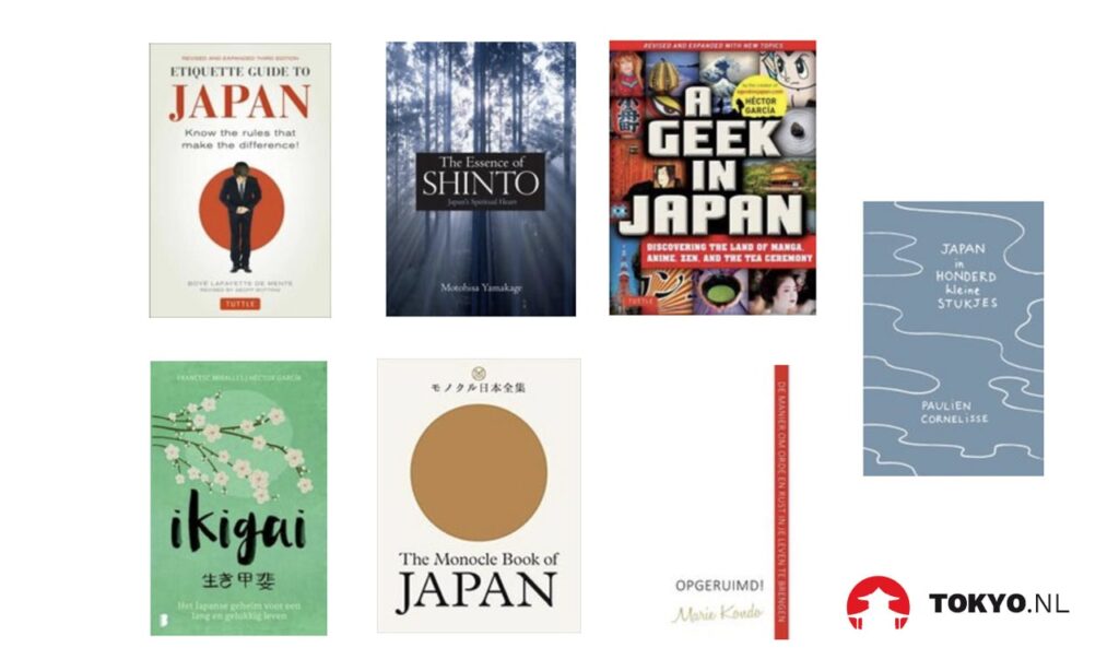 Lonely Planet Japan" Reiseführer mit charakteristischem Cover zweier tanzender weißer Kraniche vor goldenem Herbstlaub, Symbol für Japan