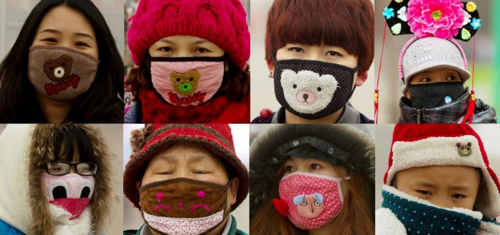 Acht Personen tragen verschiedene niedliche japanische Gesichtsmasken mit Tiermotiven